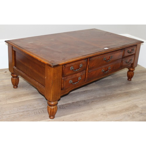 195 - A good quality modern mahogany coffee table, approx 122cm wide x 70cm deep x 48cm tall