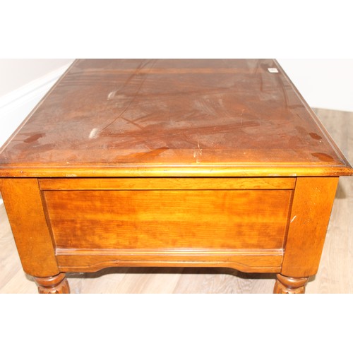 195 - A good quality modern mahogany coffee table, approx 122cm wide x 70cm deep x 48cm tall