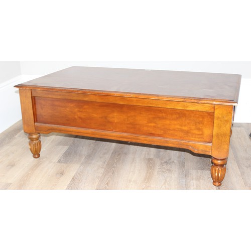 195 - A good quality modern mahogany coffee table, approx 122cm wide x 70cm deep x 48cm tall