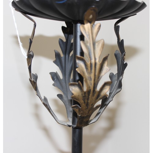 252 - A vintage painted wrought iron standard lamp with leaf design, approx 144cm tall