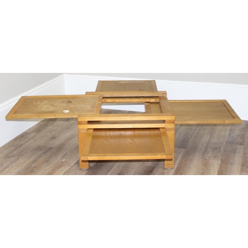 16 - An unusual retro style 4-way extendable coffee table, approx 70cm wide (190cm fully extended) x 70cm... 