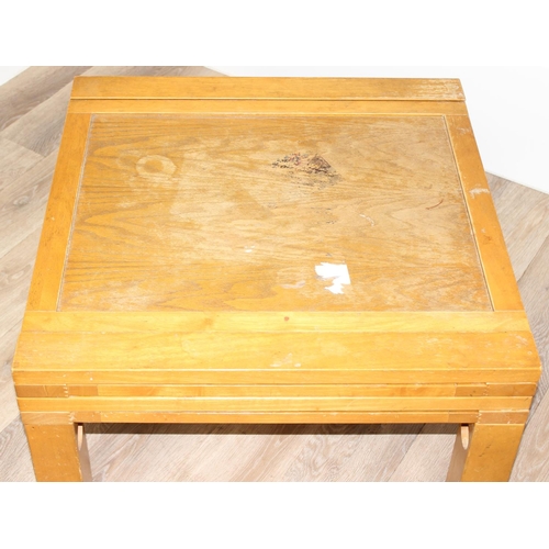 16 - An unusual retro style 4-way extendable coffee table, approx 70cm wide (190cm fully extended) x 70cm... 