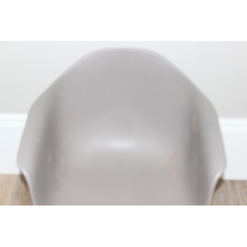 19 - A retro style plastic moulded office chair on wirework base, approx 77cm tall