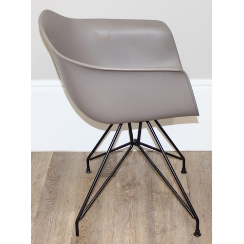 19 - A retro style plastic moulded office chair on wirework base, approx 77cm tall