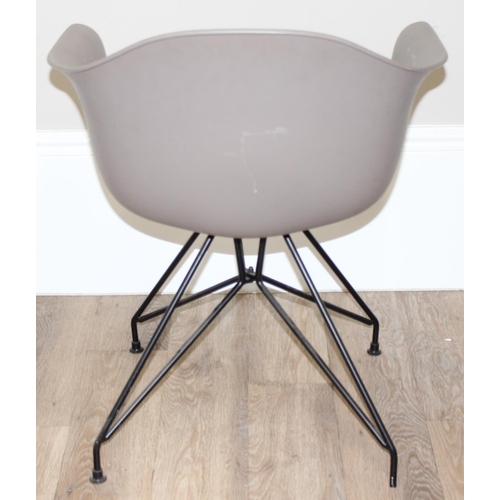 19 - A retro style plastic moulded office chair on wirework base, approx 77cm tall