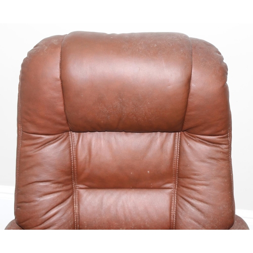 26 - A retro brown leather Ekornes style armchair and footstool, approx 75cm wide x 75cm deep x 110cm tal... 
