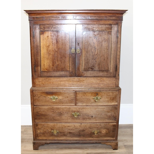 30 - An antique oak cabinet on chest, 2 over 2 chest base with cabinet top, likely 19th century, with ori... 