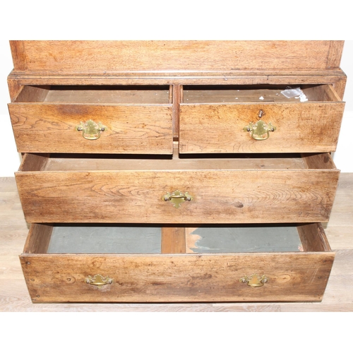 30 - An antique oak cabinet on chest, 2 over 2 chest base with cabinet top, likely 19th century, with ori... 