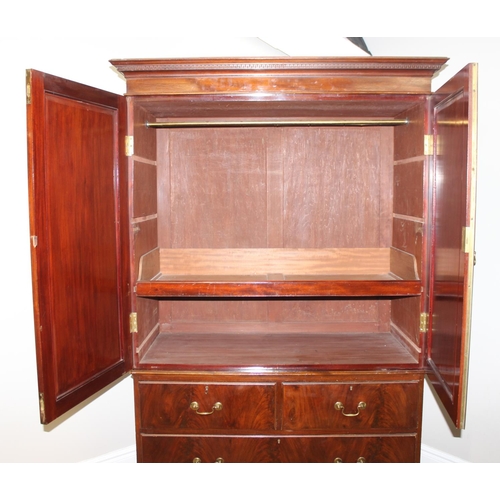 31 - A 19th century mahogany linen press cabinet, 2 over 2 drawers to base and one slide and wardrobe pol... 