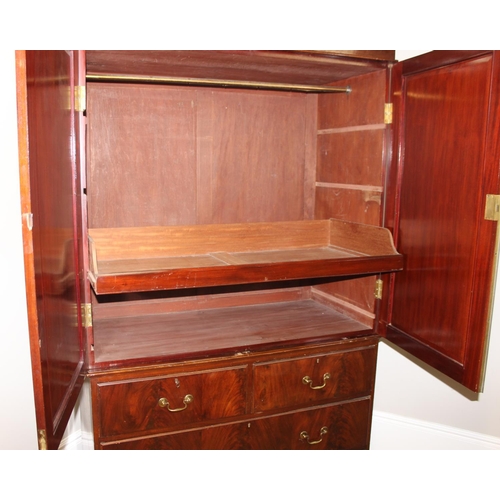 31 - A 19th century mahogany linen press cabinet, 2 over 2 drawers to base and one slide and wardrobe pol... 