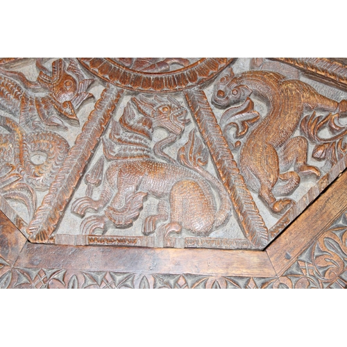 36 - A South Asian carved hardwood folding octagonal topped table with folding wooden base, approx 61cm i... 