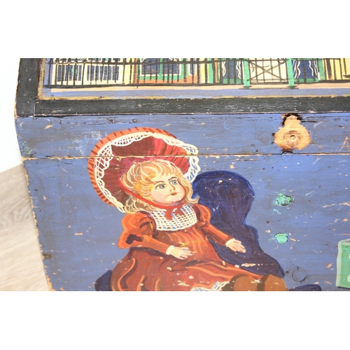 41 - A vintage painted pine children's toy box with iron cup handles, approx 61cm wide x 30cm deep x 36cm... 