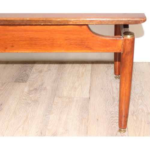 50 - Retro low coffee table with brass accents, G-Plan stamp, approx 74cm wide x 48cm deep x 45cm tall