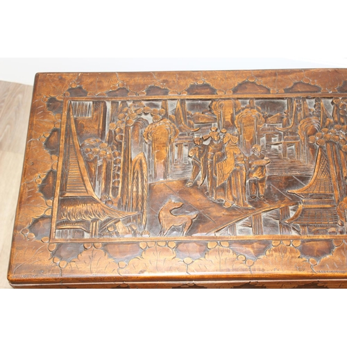 54 - An Oriental carved camphorwood chest, early-mid 20th century, approx 88cm wide x 44cm deep x 52cm ta... 