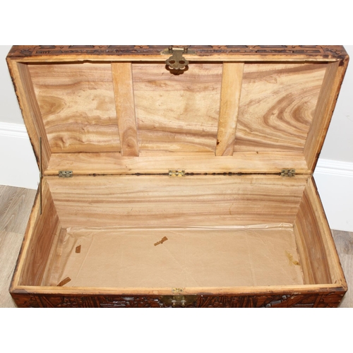 54 - An Oriental carved camphorwood chest, early-mid 20th century, approx 88cm wide x 44cm deep x 52cm ta... 