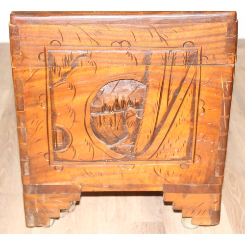 54 - An Oriental carved camphorwood chest, early-mid 20th century, approx 88cm wide x 44cm deep x 52cm ta... 