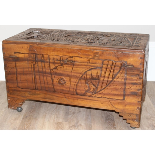 54 - An Oriental carved camphorwood chest, early-mid 20th century, approx 88cm wide x 44cm deep x 52cm ta... 