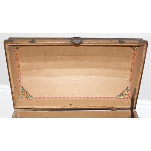 8 - An antique dome-topped chest or shipping trunk with wooden slats and iron fittings, approx 76cm wide... 