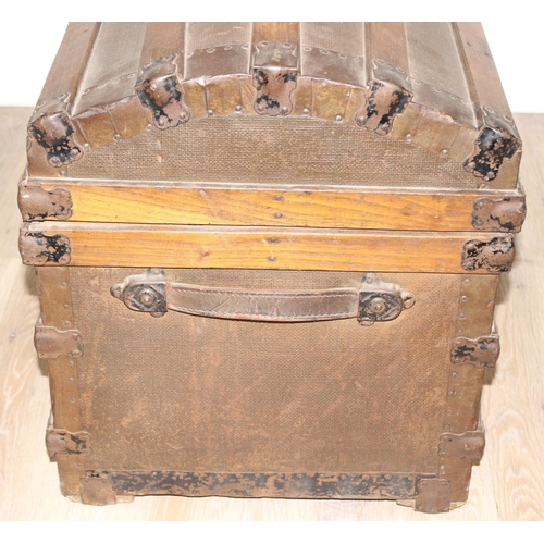 8 - An antique dome-topped chest or shipping trunk with wooden slats and iron fittings, approx 76cm wide... 