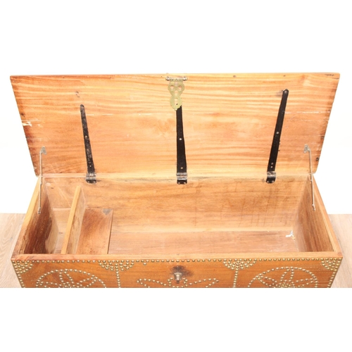 5 - A vintage brass studded hardwood Zanzibar chest, profusely decorated with brass studs, likely early ... 