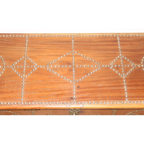 5 - A vintage brass studded hardwood Zanzibar chest, profusely decorated with brass studs, likely early ... 