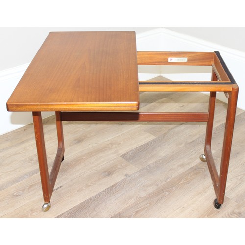 48 - A.H. Mcintosh, A Mid-Century Triform nest of tables, the largest table with a folding revolving top,... 