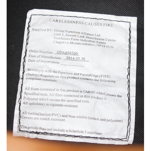 26 - A retro brown leather Ekornes style armchair and footstool, approx 75cm wide x 75cm deep x 110cm tal... 