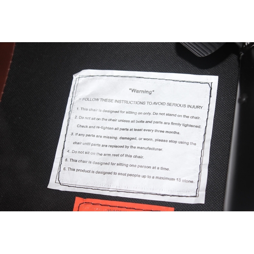 26 - A retro brown leather Ekornes style armchair and footstool, approx 75cm wide x 75cm deep x 110cm tal... 