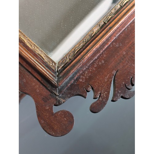 549R - A Georgian mahogany framed fretwork wall mirror with carved gilt eagle, approx 92cm x 53cm