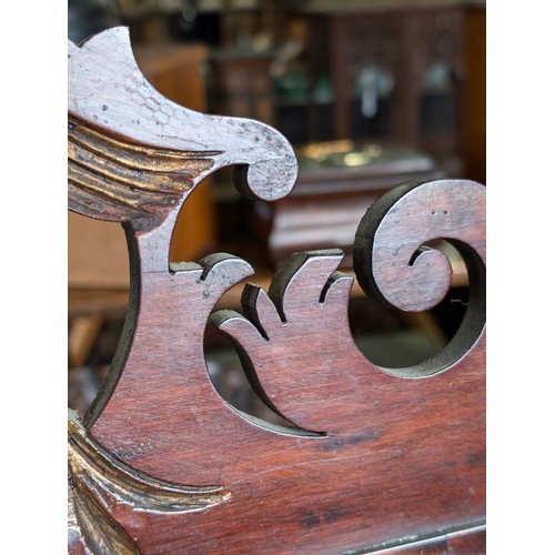 549R - A Georgian mahogany framed fretwork wall mirror with carved gilt eagle, approx 92cm x 53cm