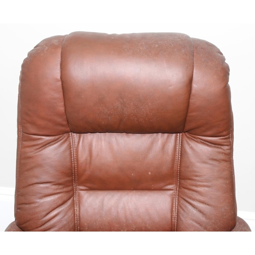 61 - A retro brown leather Ekornes style armchair and footstool, approx 75cm wide x 75cm deep x 110cm tal... 