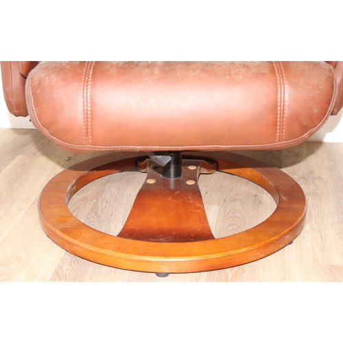 61 - A retro brown leather Ekornes style armchair and footstool, approx 75cm wide x 75cm deep x 110cm tal... 