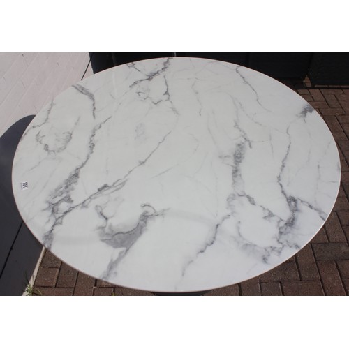 315 - A marble effect round topped garden table with metal base, approx 110cm in diameter x 75cm tall