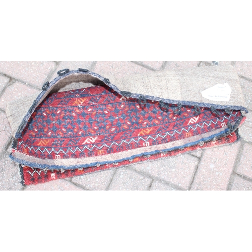 213 - 2 donkey bag style rugs, one with kilim back, the largest approx 65cm x 48cm