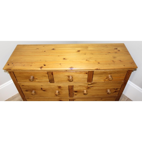 163 - A modern pine 7 drawer chest of drawers, 3 short over 4 long, approx 62cm wide x 44cm deep x 122cm t... 