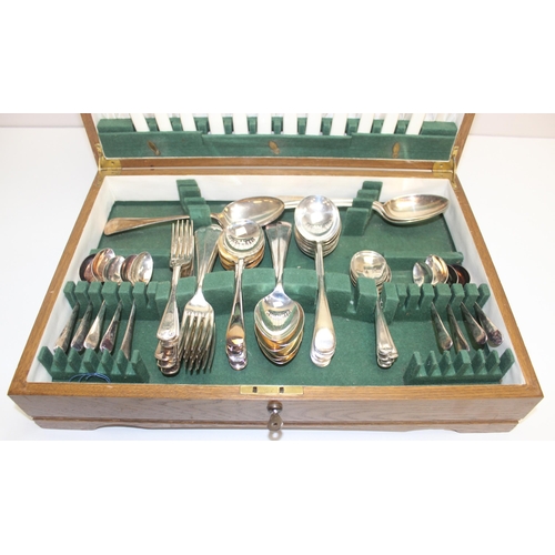 1053 - A vintage oak cased canteen of silver plated cutlery, extensive but harlequin set