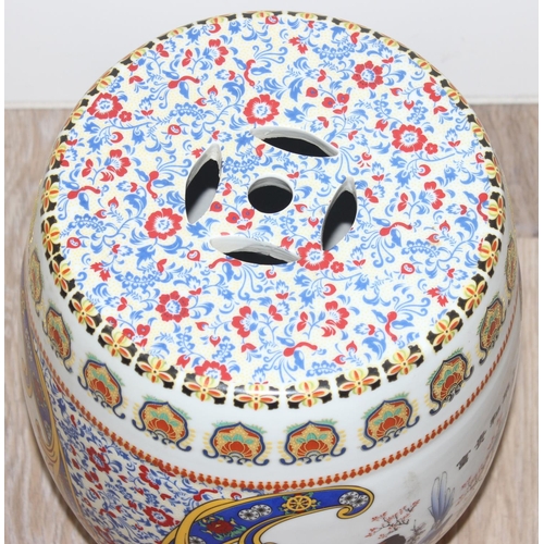 322 - Highly decorative Chinese porcelain garden table with Oriental design and 4 stools, table approx 93c... 