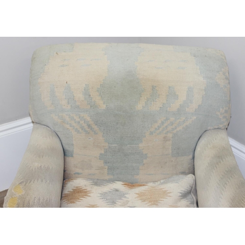 15 - George Smith of Newcastle, an antique style kilim upholstered club chair, 20th century, with sweepin... 