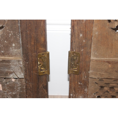 17 - 2 antique Indian carved and pierced wooden doors or window shutters, likely 19th century, each appro... 