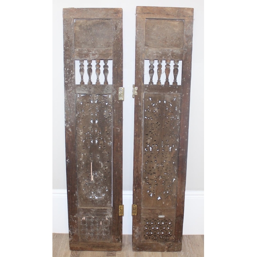 17 - 2 antique Indian carved and pierced wooden doors or window shutters, likely 19th century, each appro... 