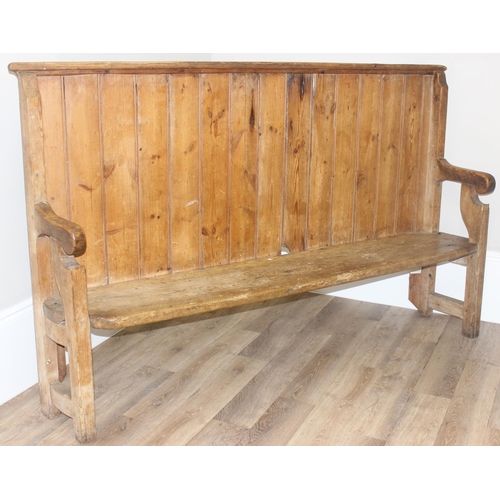 2 - An unusual antique pine pew or bench with high panelled back, one end shaped for corner, likely 19th... 