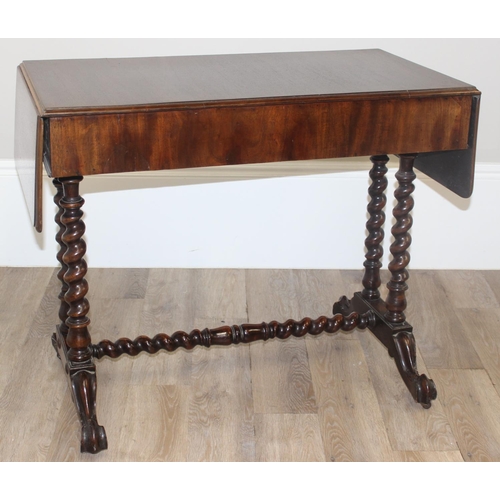 21 - A 19th century mahogany sofa table with barley twist supports and brass handles and accents, approx ... 