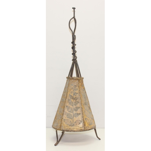 233 - A vintage animal hide covered candle lamp with wrought metal frame, approx 59cm tall