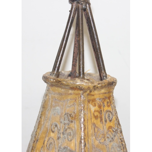 233 - A vintage animal hide covered candle lamp with wrought metal frame, approx 59cm tall