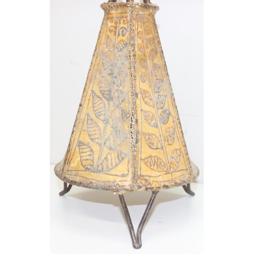 233 - A vintage animal hide covered candle lamp with wrought metal frame, approx 59cm tall