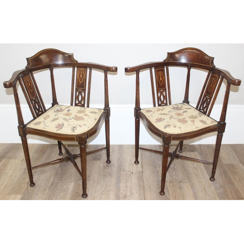 24 - A pair of Victorian Sheraton Revival corner chairs with wooden inlay and floral upholstered seats, e... 