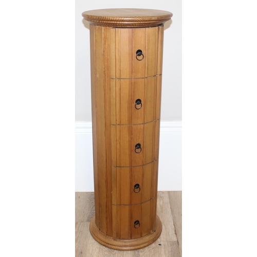 28 - An unusual small round pine 5 drawer chest of drawers, approx 30cm in diameter x 86cm tall