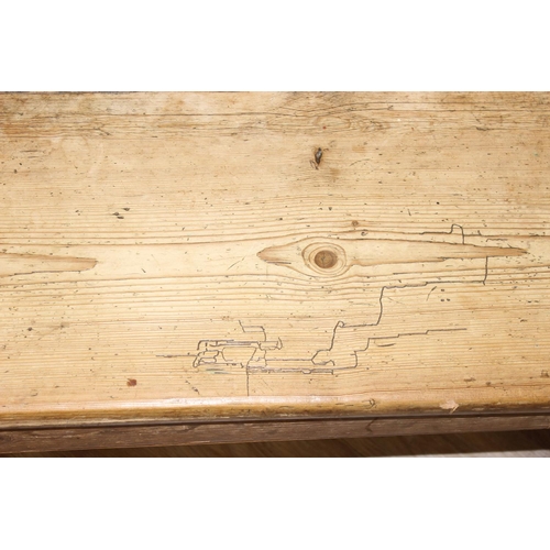 3 - An antique rustic pine bench with shaped arms and high back, likely 19th century, approx 205cm wide ... 