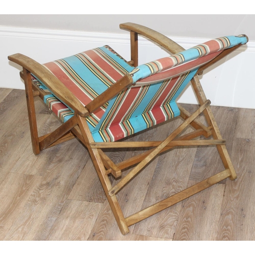 300 - 2 vintage wooden folding deck chairs with colourful fabric, largest approx 110cm tall