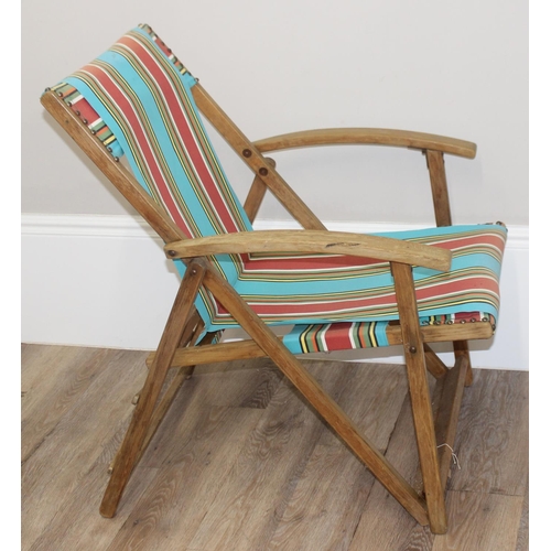 300 - 2 vintage wooden folding deck chairs with colourful fabric, largest approx 110cm tall